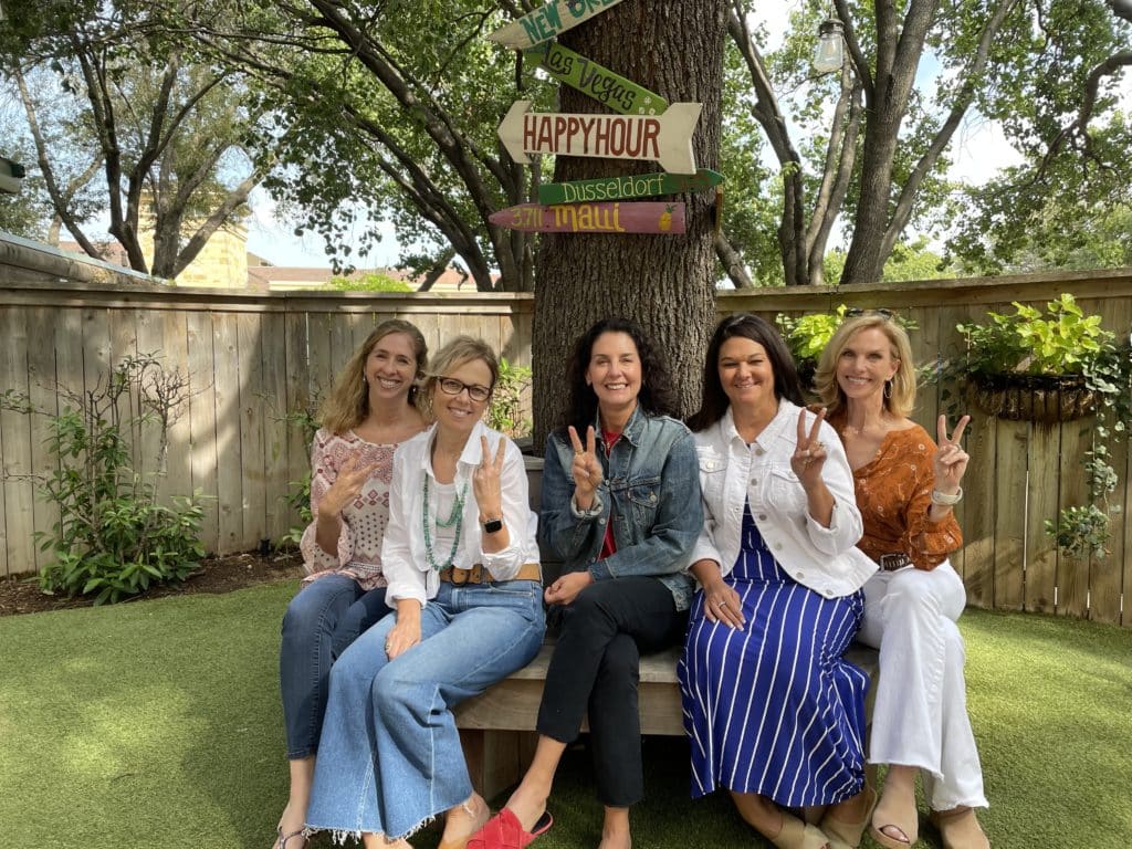 Team with Directional Signage